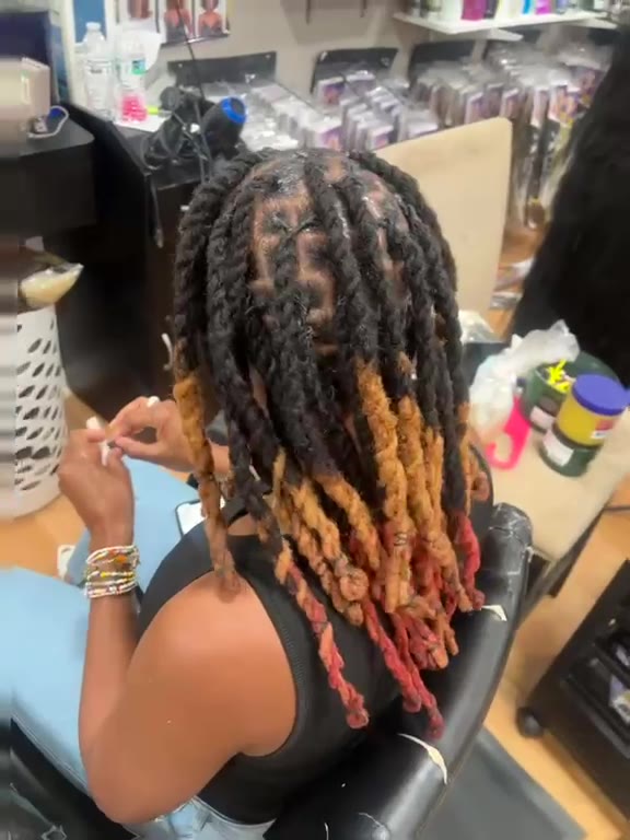Loc retwist styled by Joy