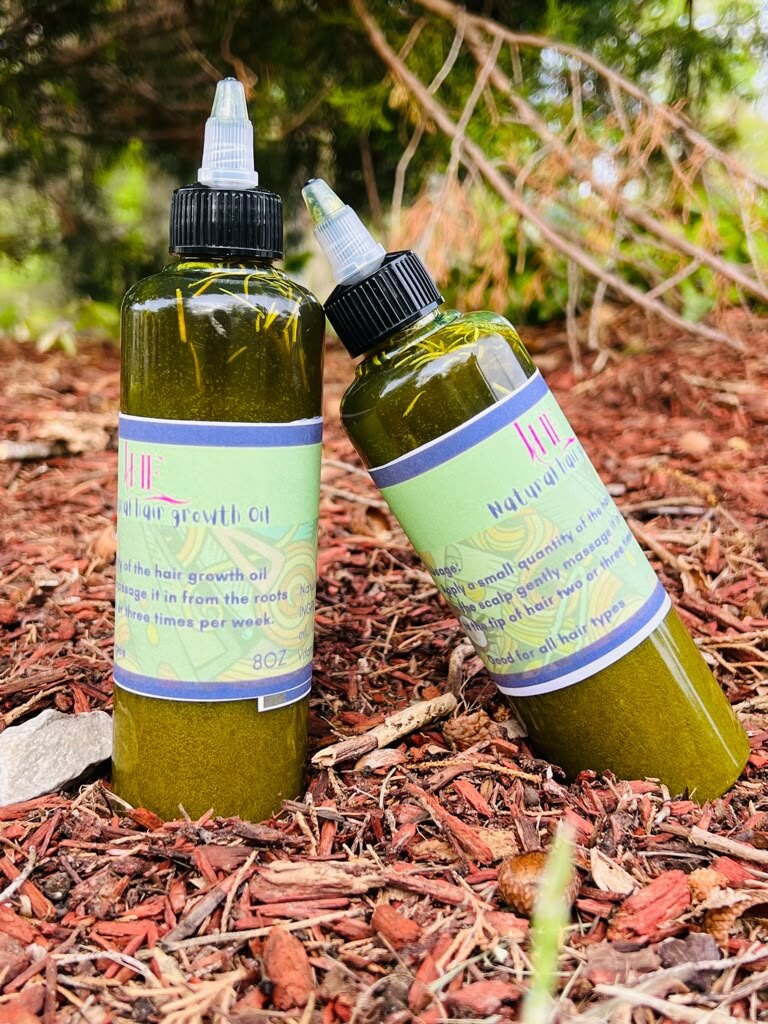 Two bottles of Joy’s Hair-Growth Oil